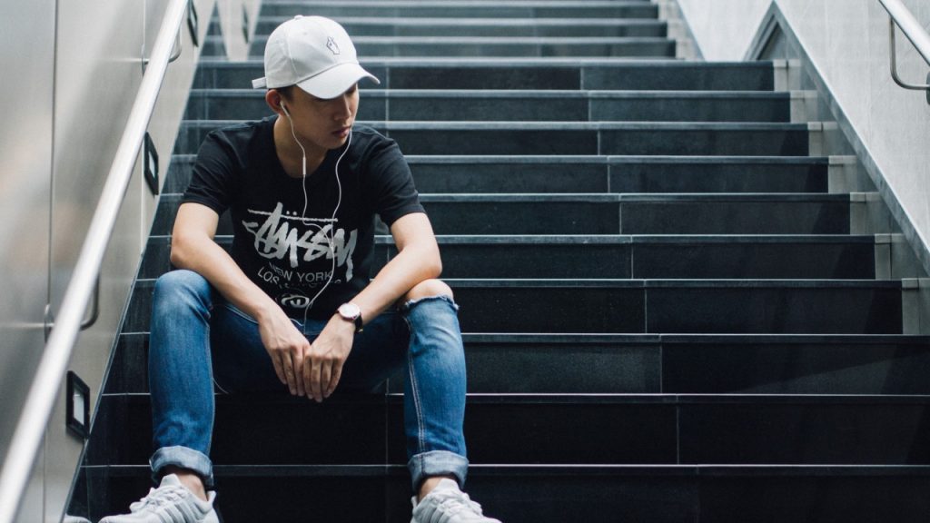 Man sitting on stairs