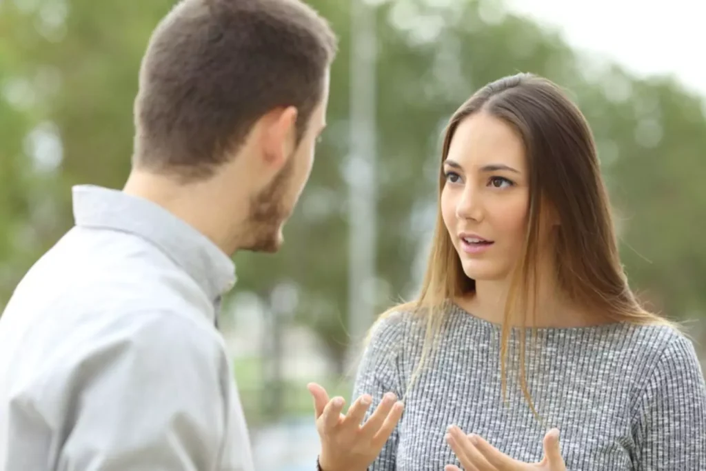a man and woman dealing with conflict in a conversation