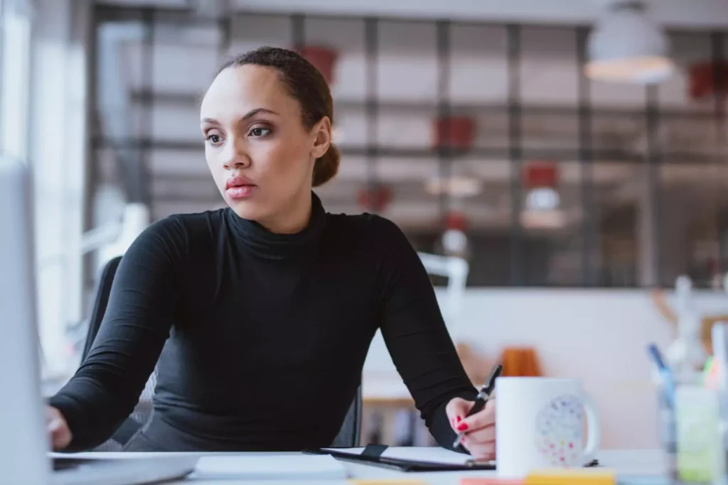 a woman working on her computer, is she too busy?