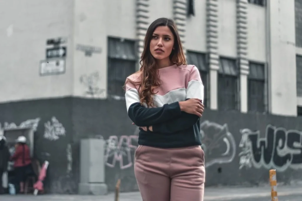 a woman crossing her arms representing cancel culture