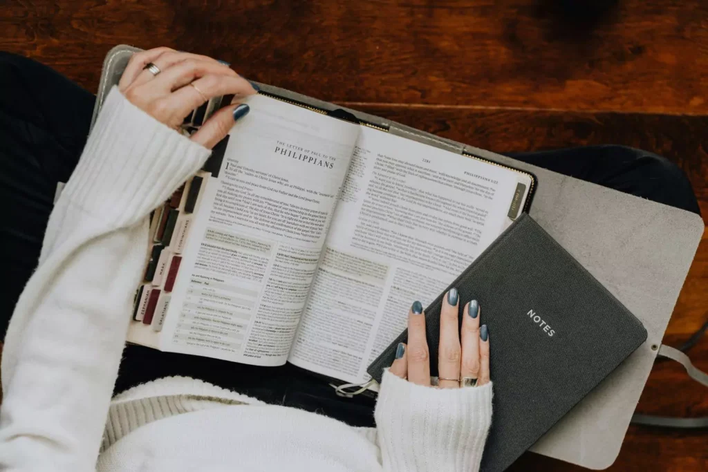 a woman doing a spiritual rhythm of reading her Bible