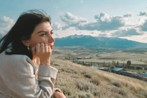 a woman pondering her significance