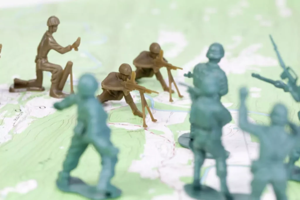 army figurines resolving a conflict on the battlefield