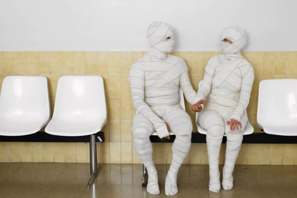 two mummys, holding hands; human beings with flaws