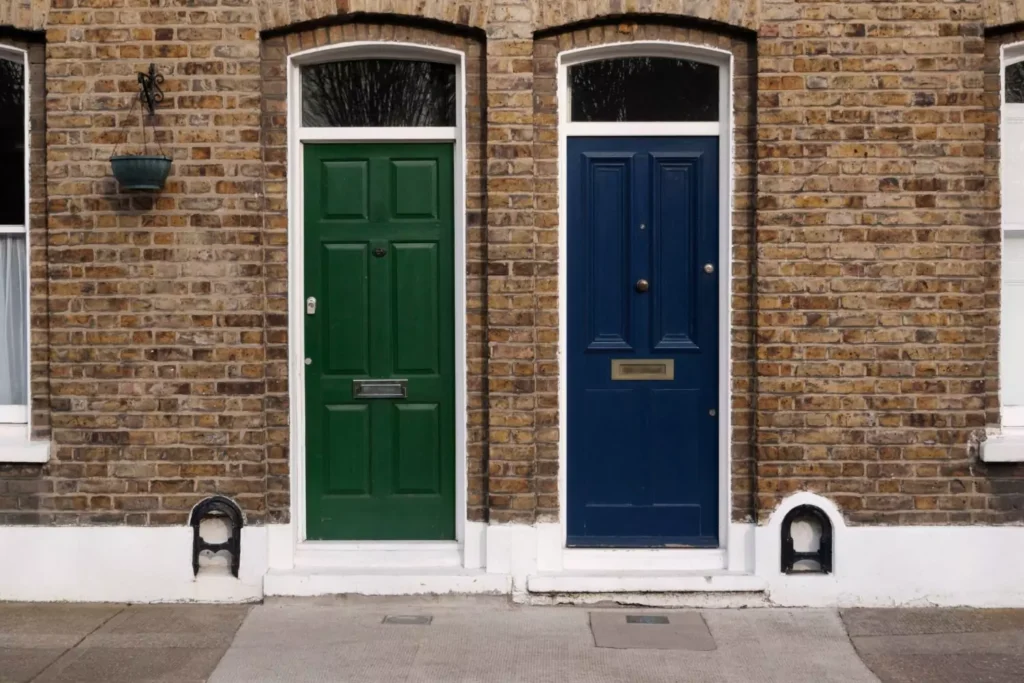two doors representing neighbors that are waiting to meet each other