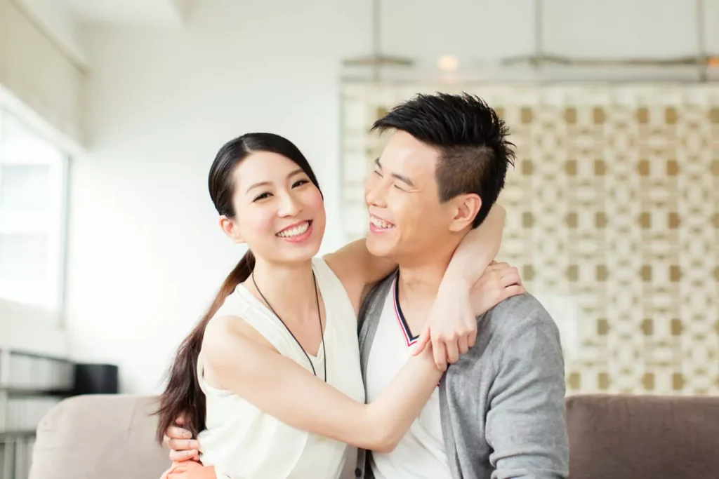 a couple hugging, they are in a drama-free relationship