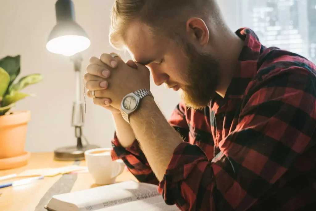 a man engaging in prayer